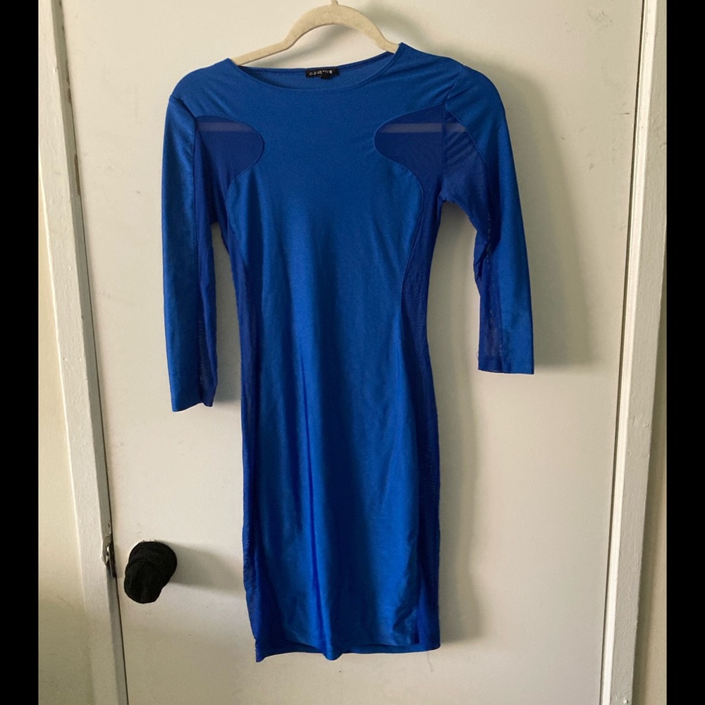 Royal blue bodycon dress with sheer lace on sides, size small.